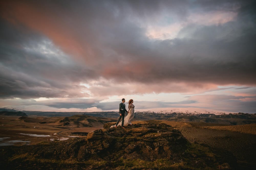 Iceland elopement example - couple photos by a glacier