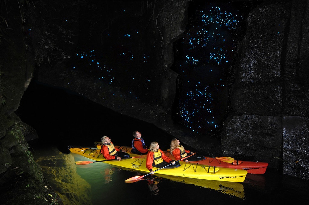 What to do on your New Zealand elopement - kayak in glowworm cave