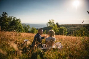 Couple recounting their adventure elopement journey with Zephyr & Luna.