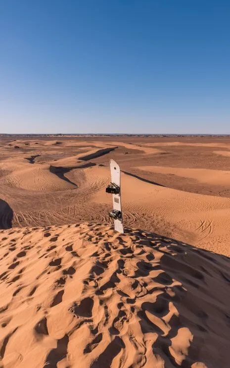 What to do on your Morocco elopement - Sand boarding