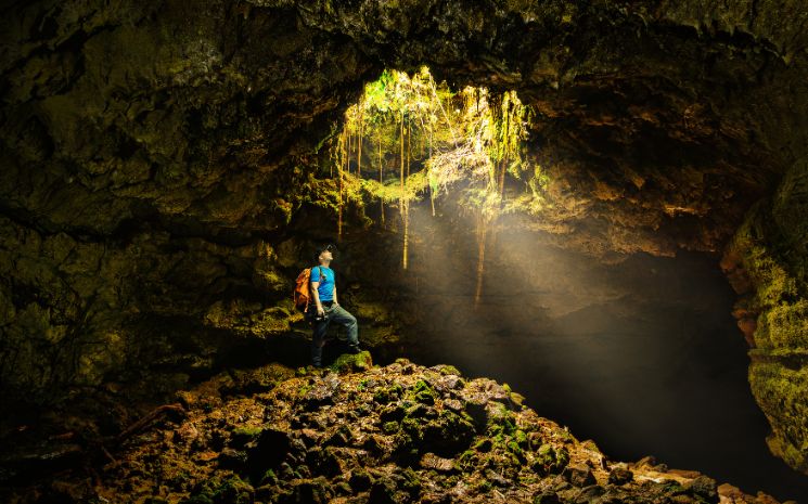 Exploring a lava tube cave in the Azores