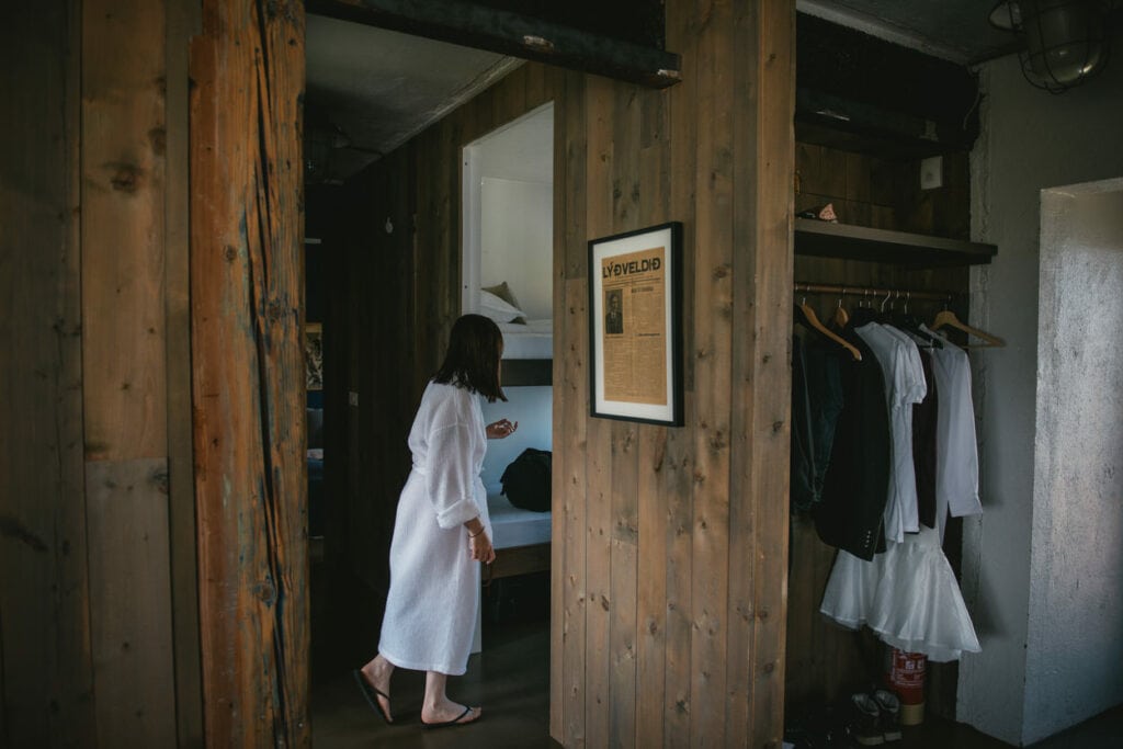 Bride getting ready in the her rustic room in a cottage in Iceland