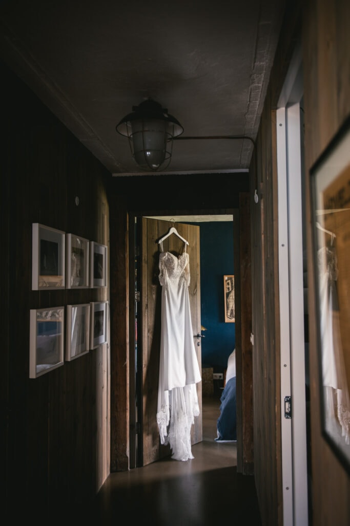 Wedding dress waiting to be put on in a cottage during an elopement in Iceland