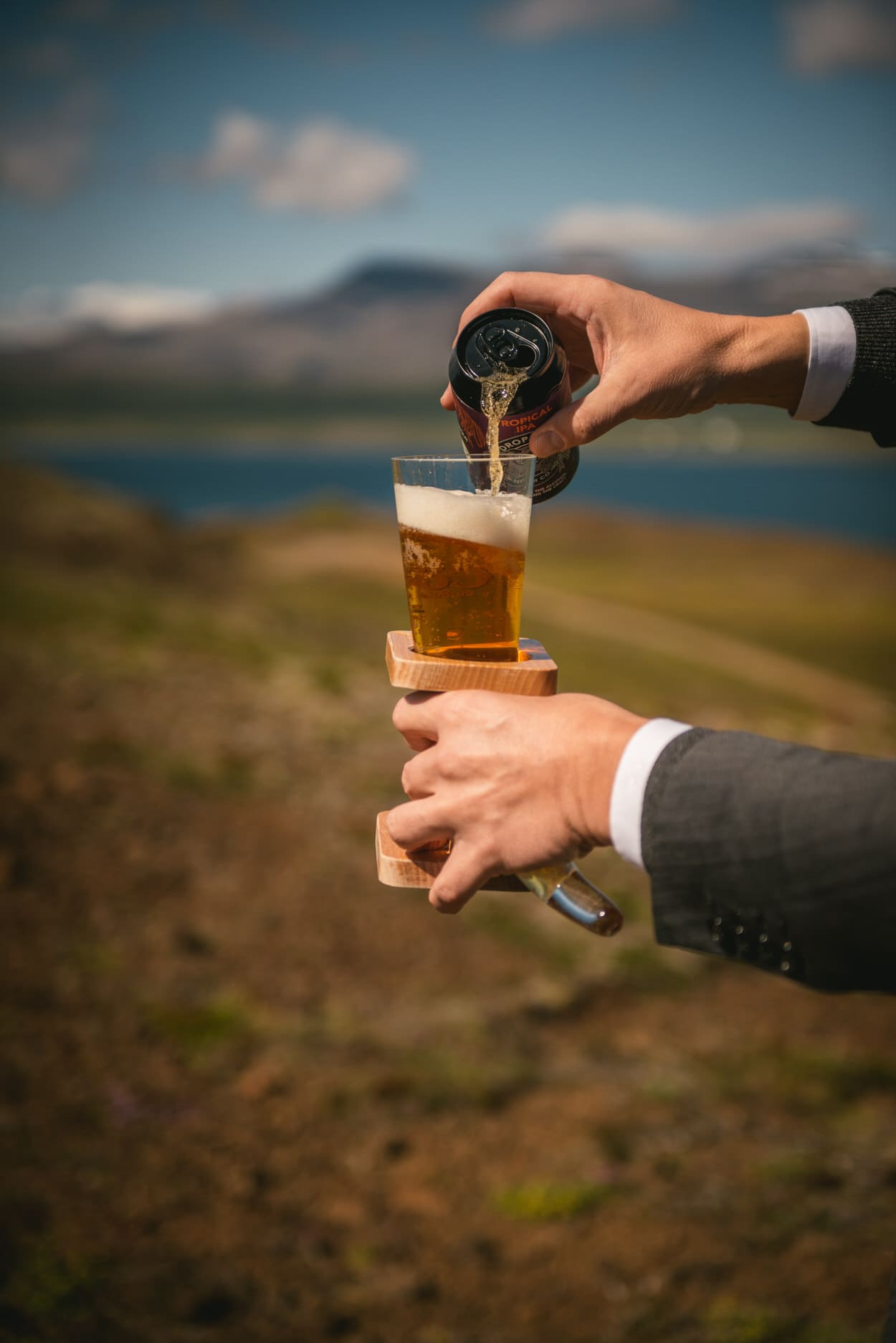 Drop bear beer being poured in a glass horn for a ceremony in Iceland