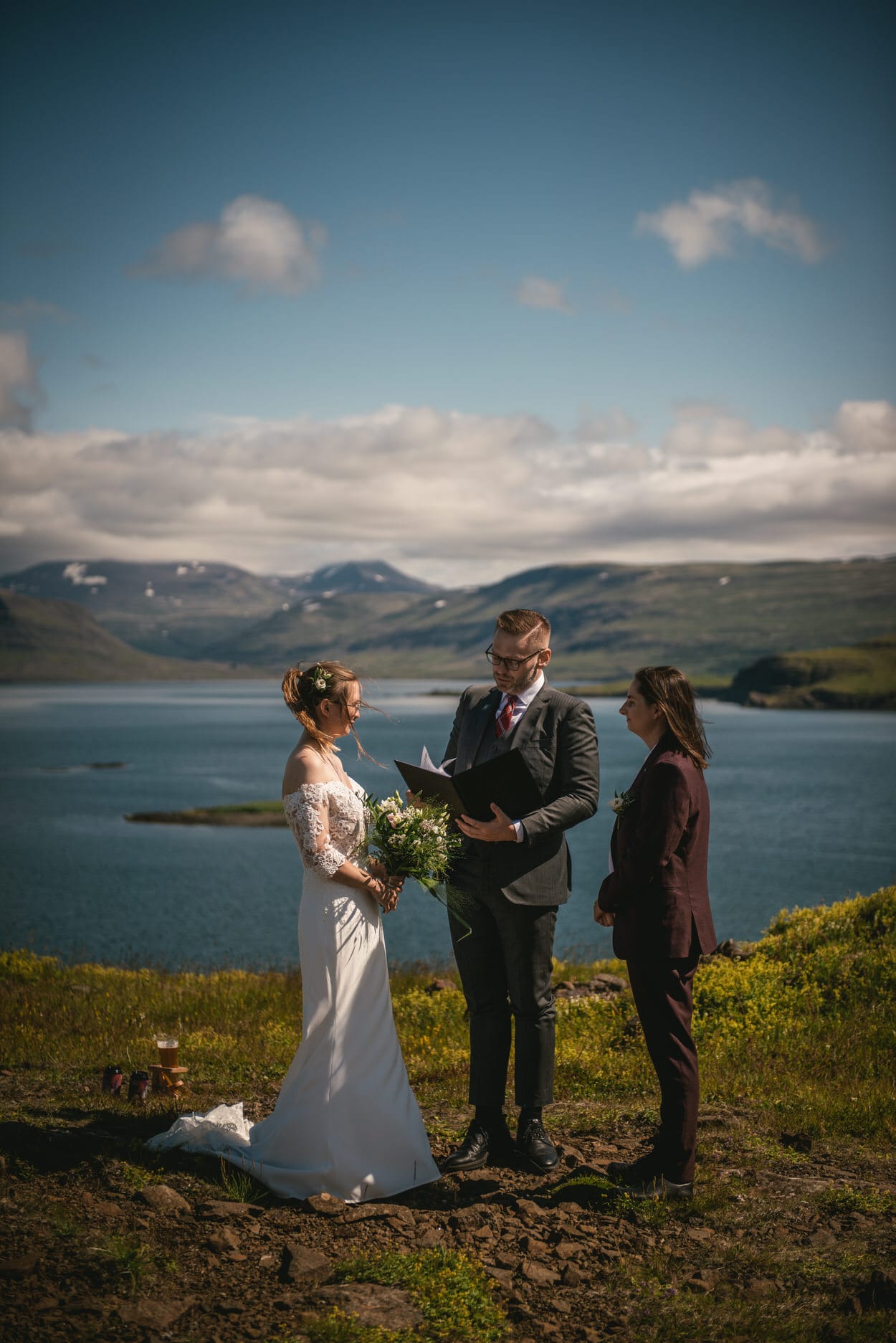 Icelandic celebrant with a same-sex couple during their elopement ceremony