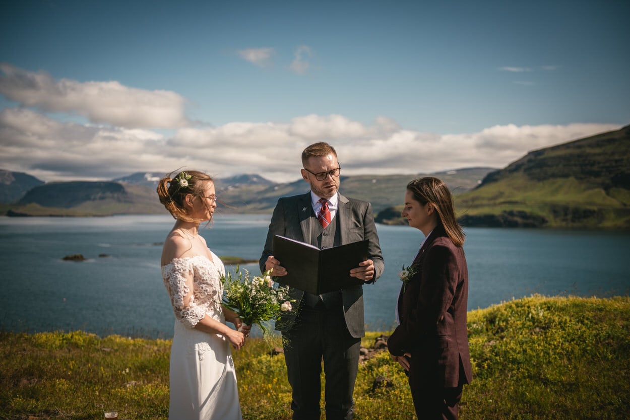 Celebrant and a couple of brides exchanging their vows in Iceland