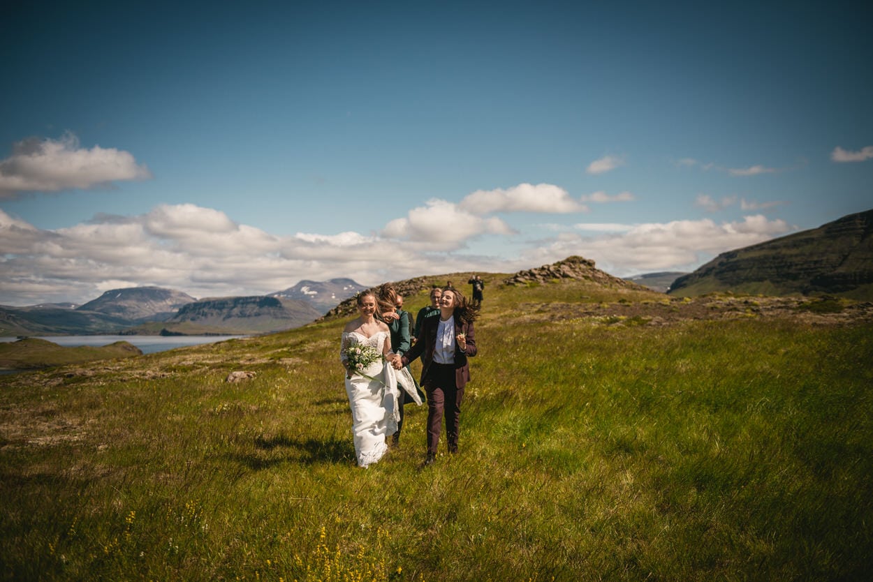 Brides cheering after they got married in Iceland