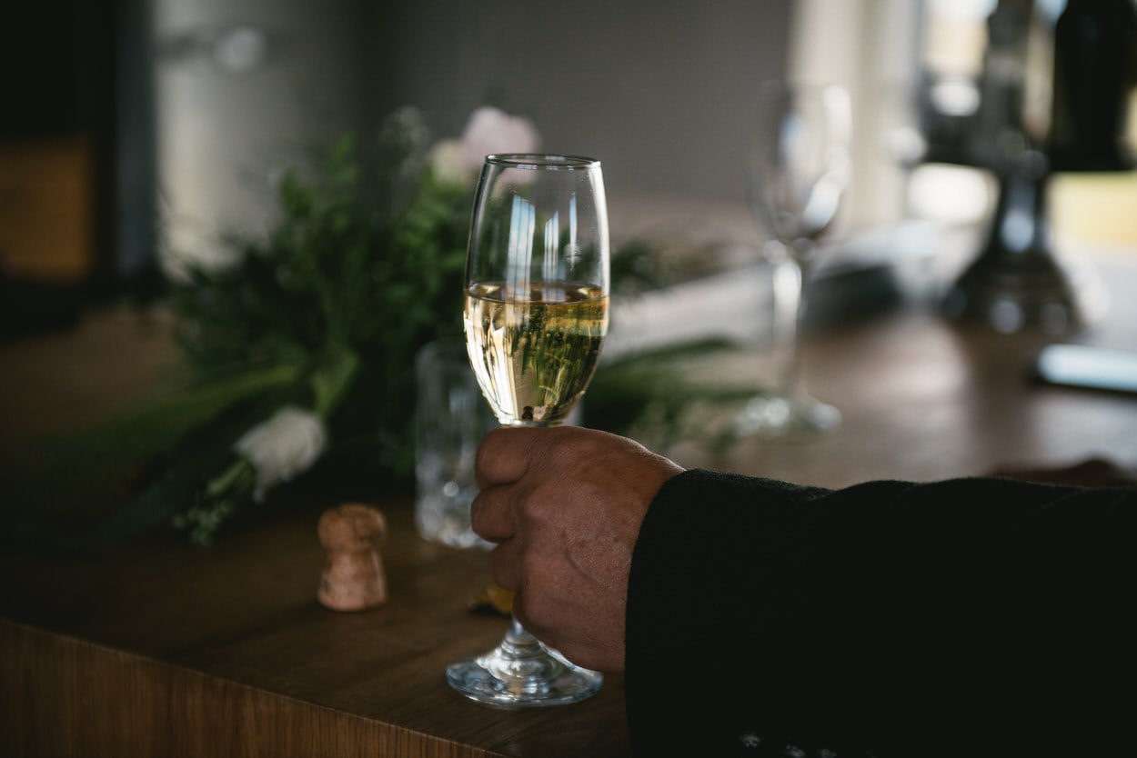 Glass full of champagne to toast after an elopement ceremony in Iceland