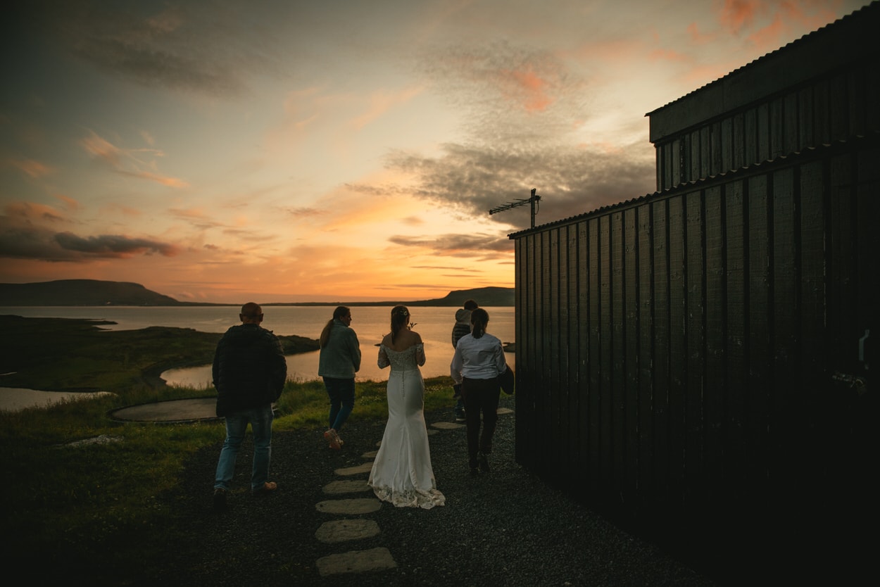 Brides getting back to their cottage after their elopement ceremony in Iceland