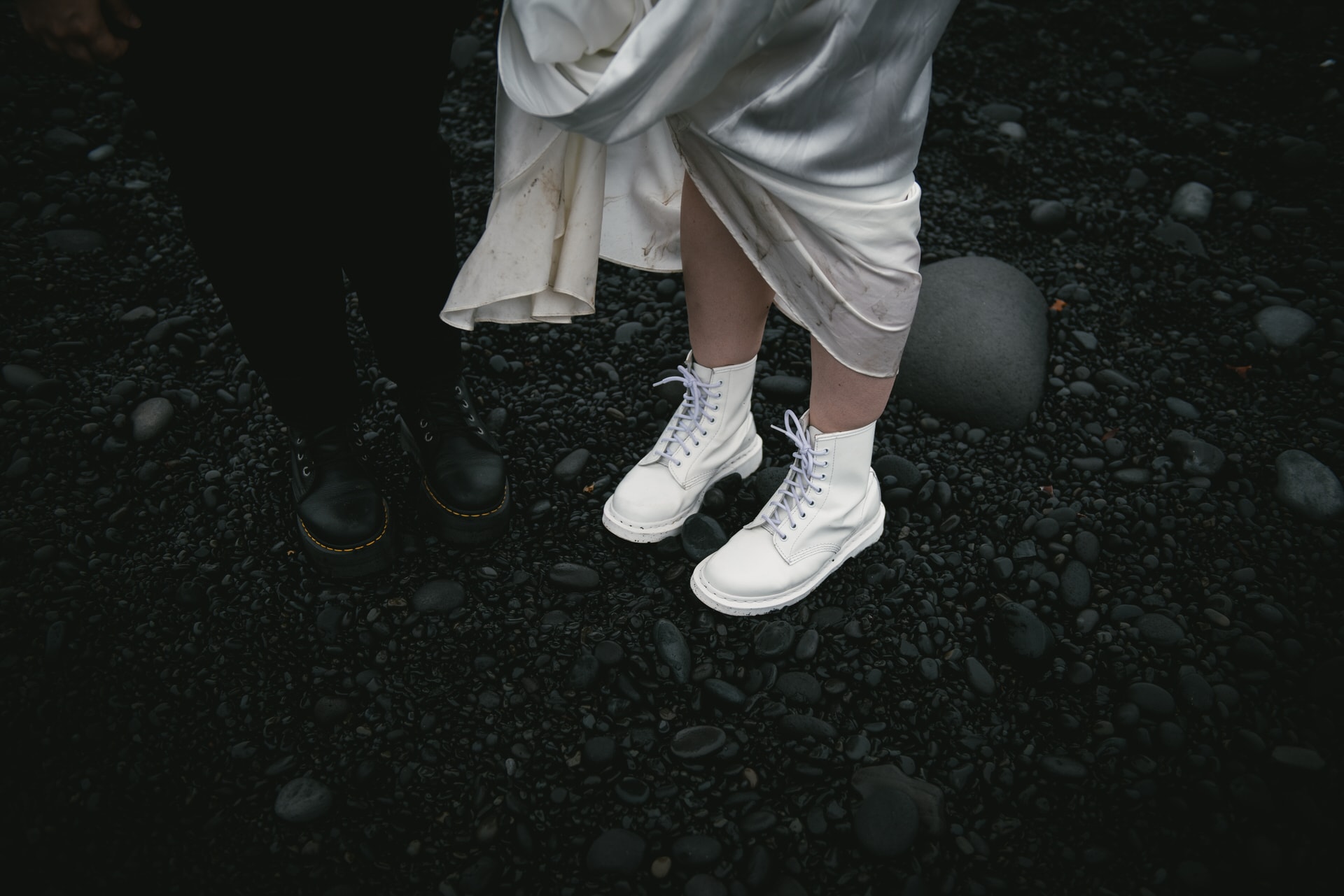 Bride's shoes on a black sand beach in Iceland