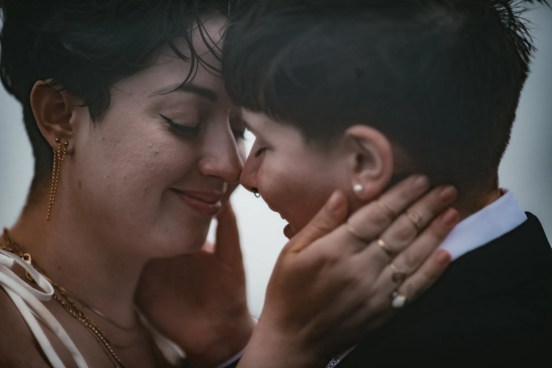 Wives kissing each other on their elopement day in Iceland