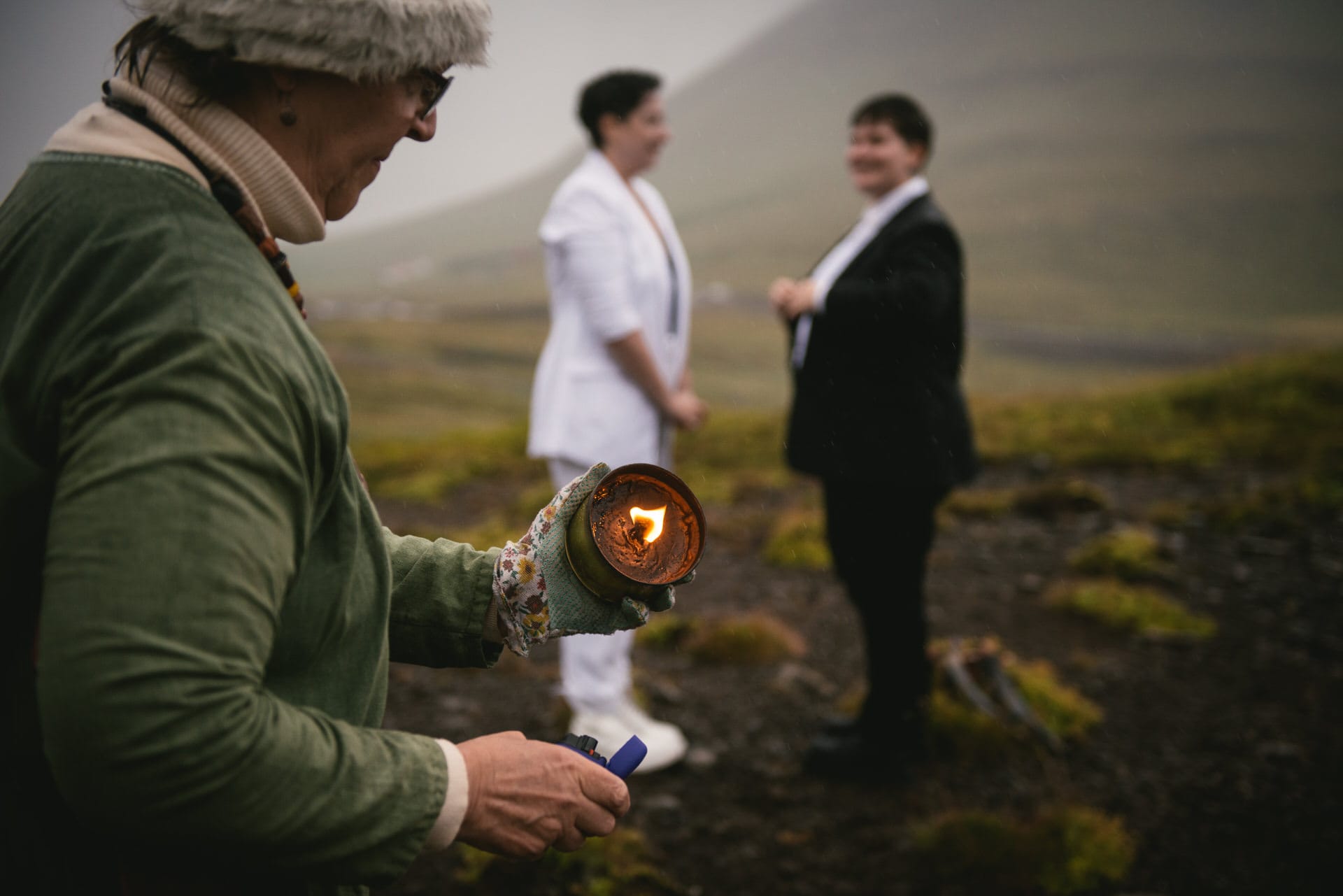 Lighting up candles to symbolize fire before a Pagan wedding ceremony in Iceland