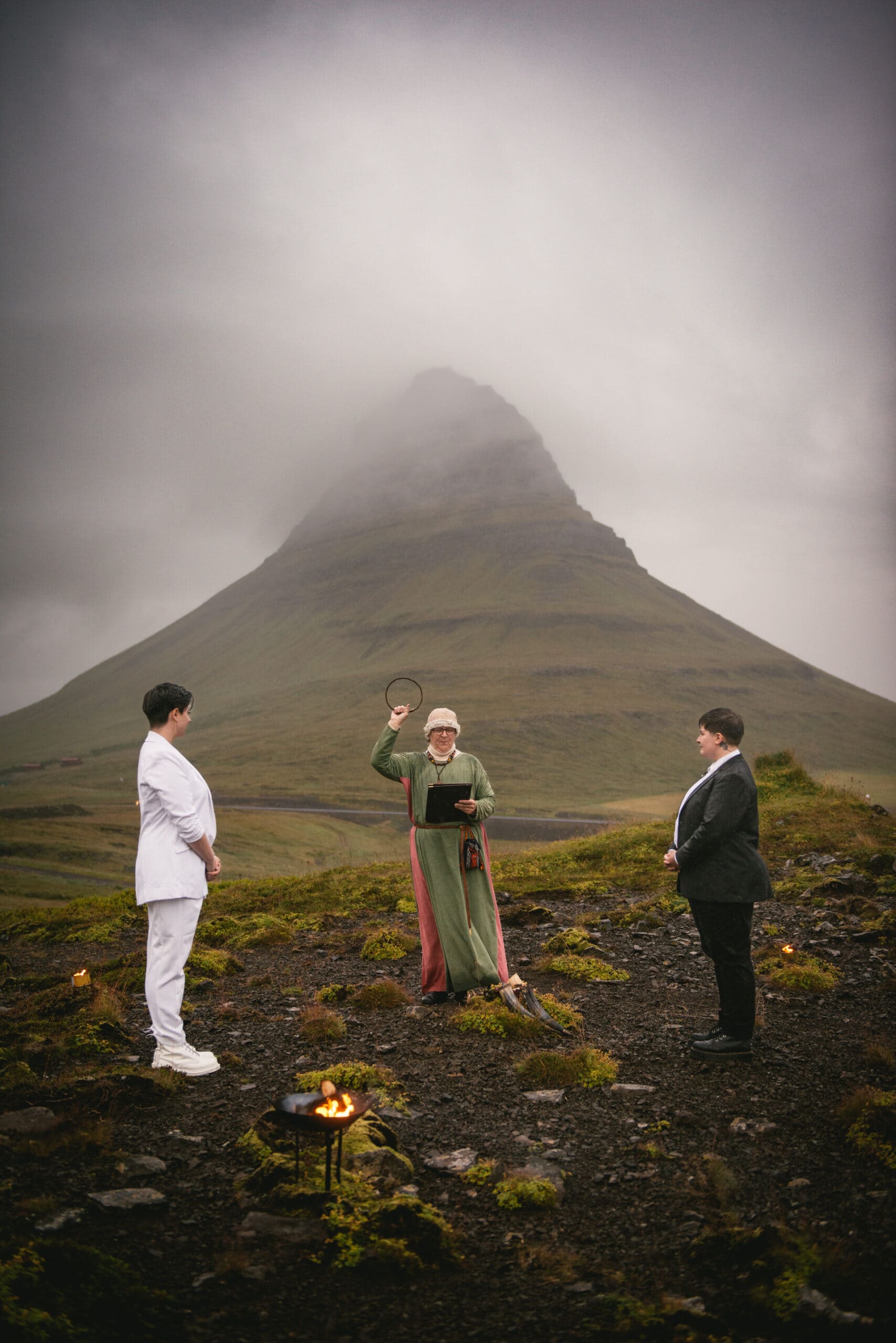 High priestess invoking the earth during a Pagan wedding ceremony in Iceland
