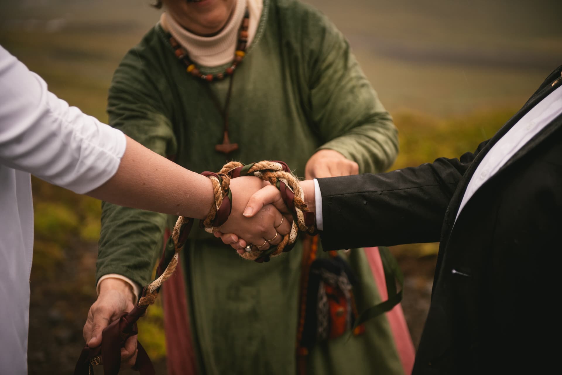 Detail of a handfasting ceremony during a Pagan wedding ceremony in Iceland