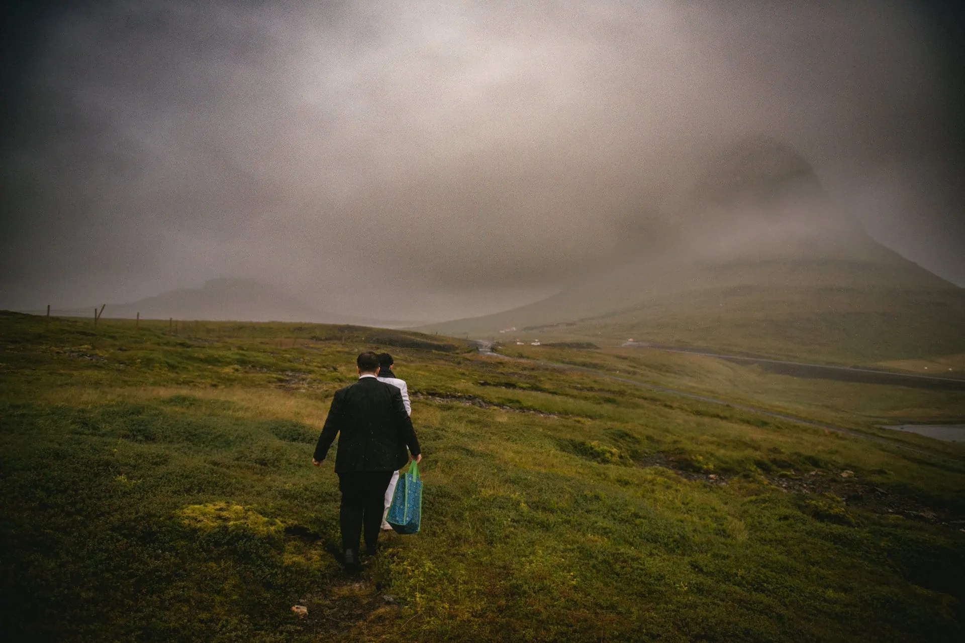 Brides walking back to the car after their Pagan wedding ceremony in Iceland