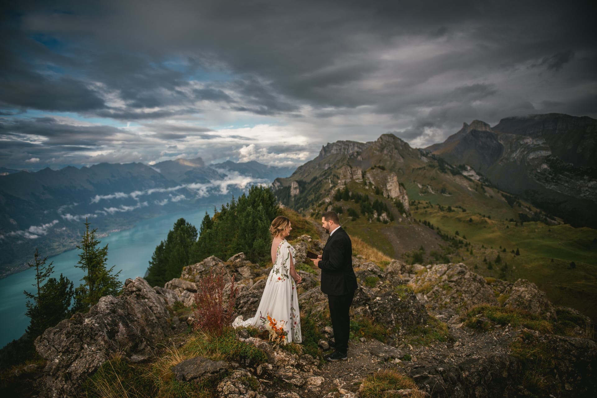 Couple exchanging their vows at Schynigge Platte during their elopement in Switzerland