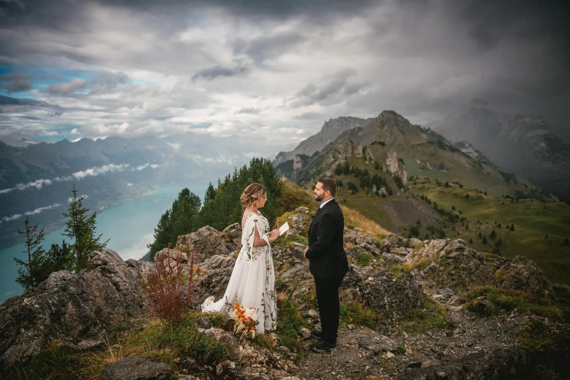 Couple exchanging their vows at Schynigge Platte during their elopement in Switzerland