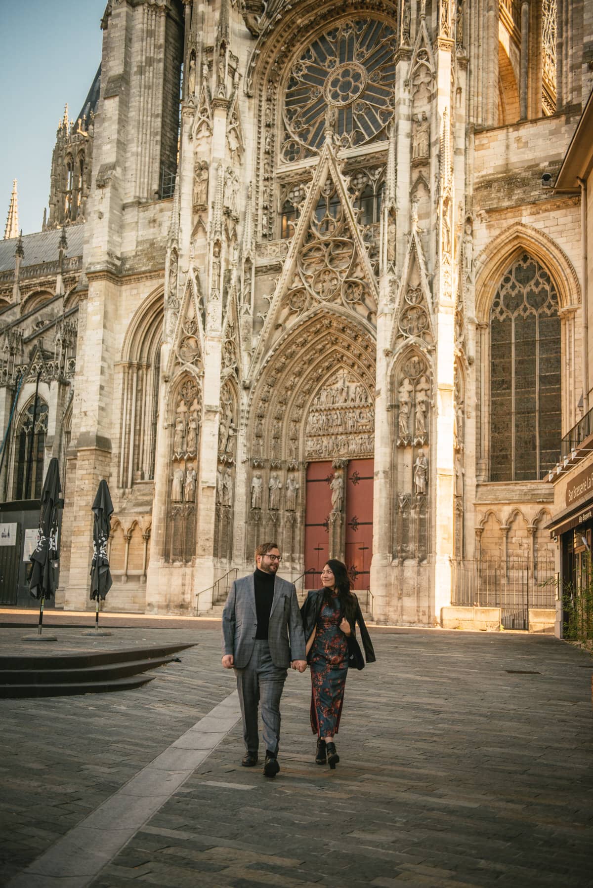 Couple wandering in the streets of Rouen before their elopement in Normandy