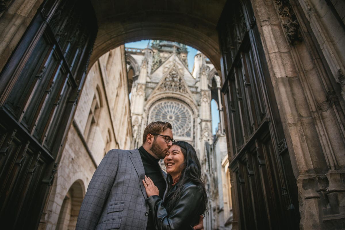 Couple at the Rouen cathedral before their elopement in Normandy