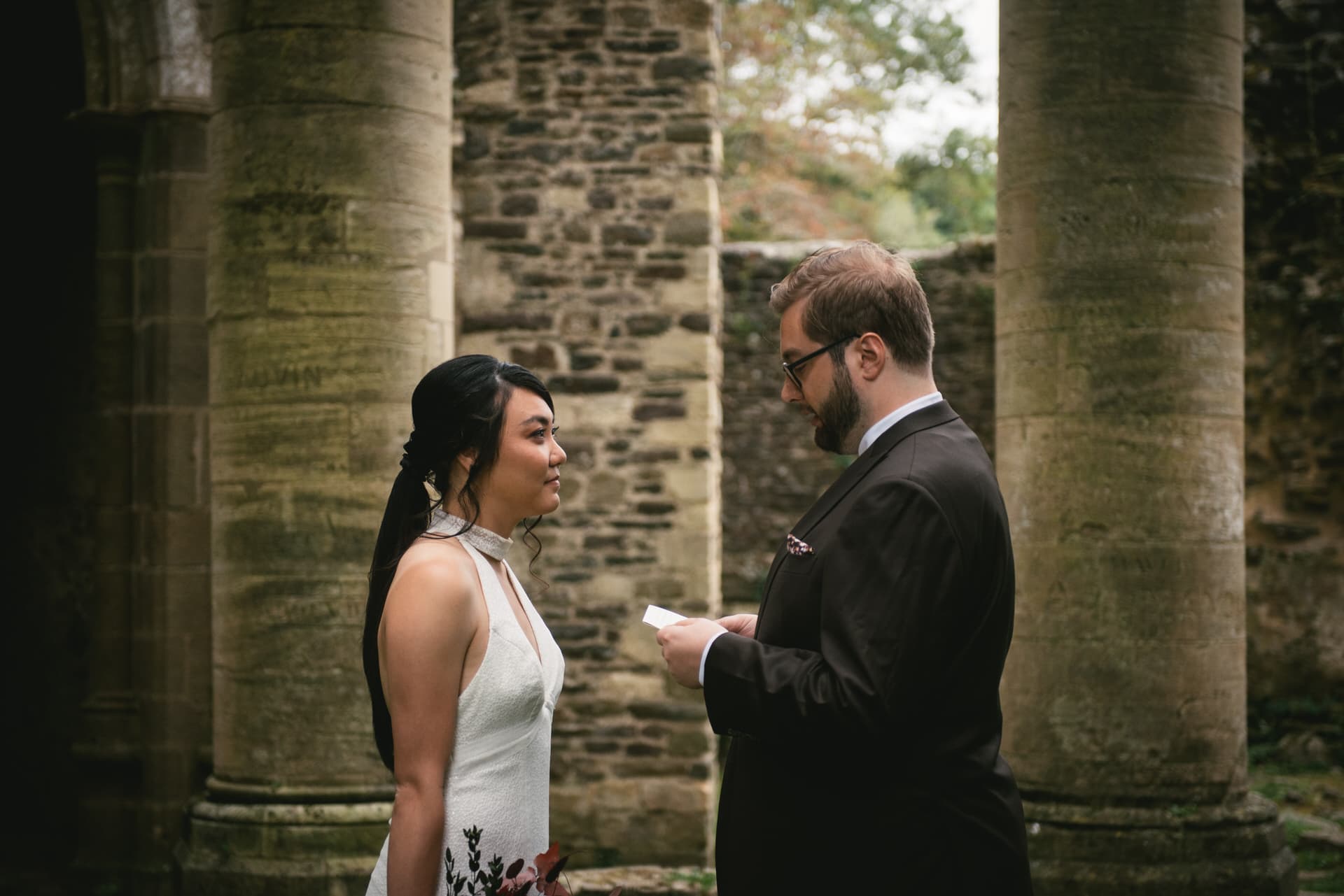 Couple eloping in Normandy at the Abbaye d'Hambye ruined chapel