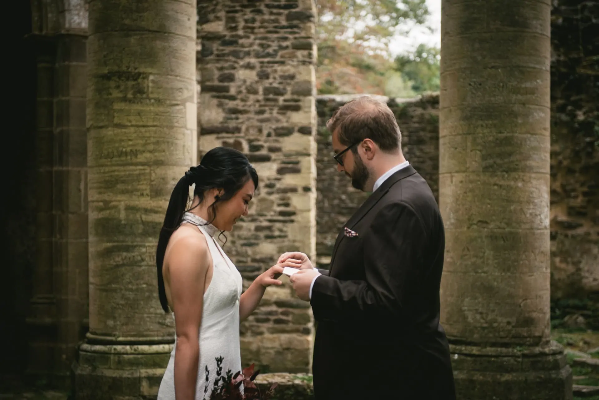 Couple eloping in Normandy at the Abbaye d'Hambye ruined chapel