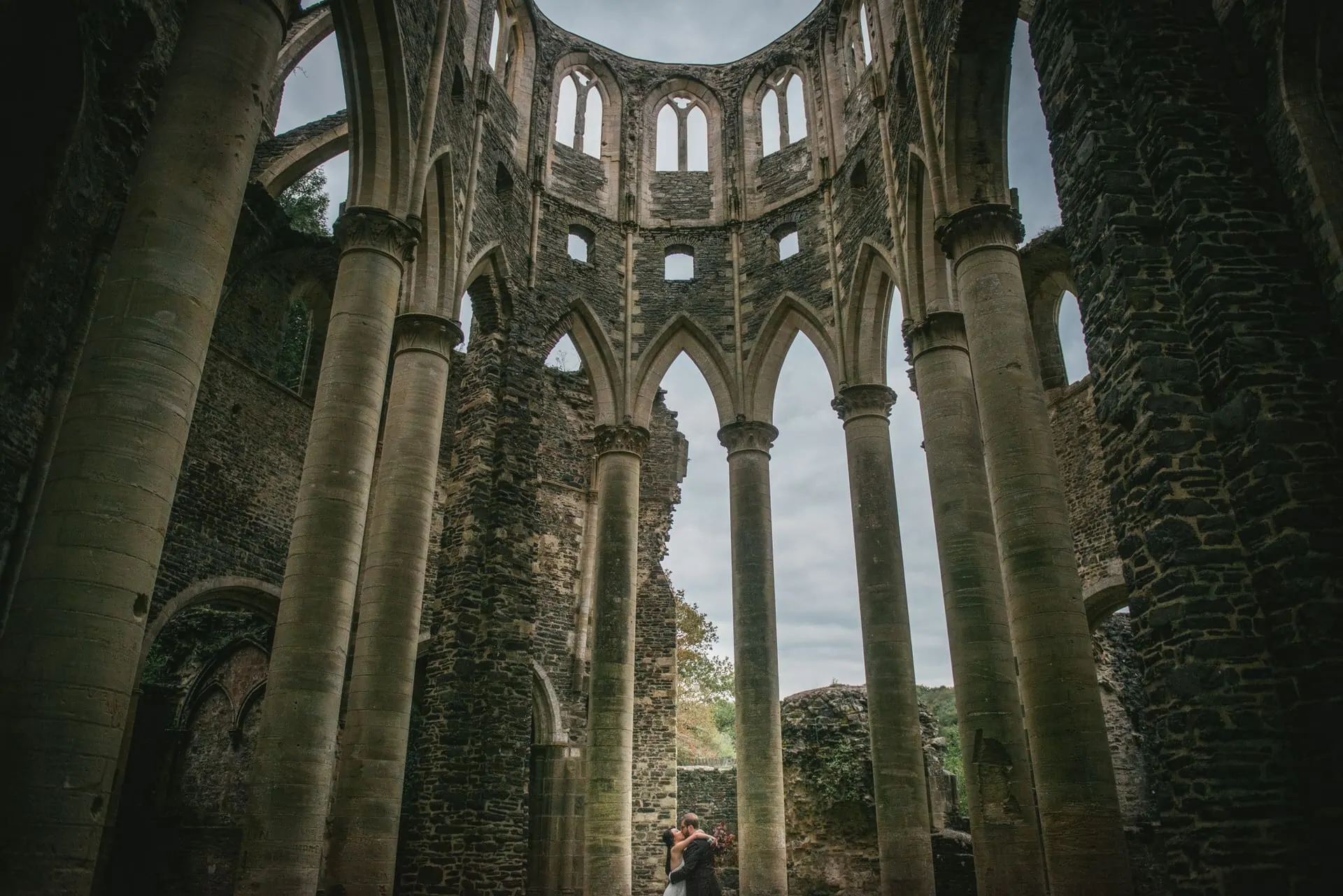 Couple eloping in Normandy at the Abbaye d'Hambye ruined chapel