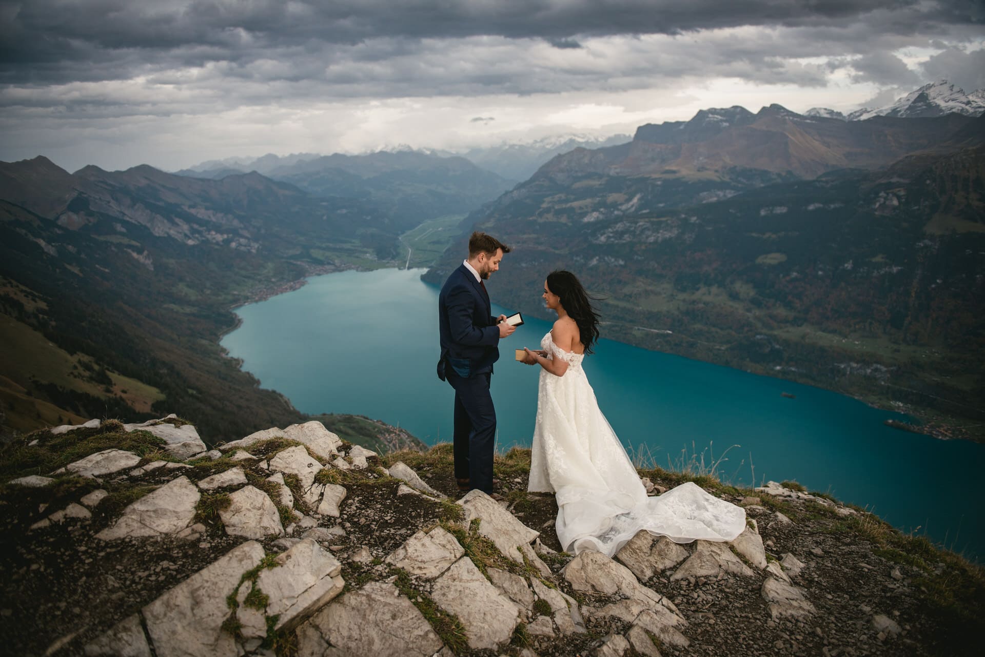 Couple on their elopement day in the Interlaken region of Switzerland - ceremony overlooking the Brienz lake