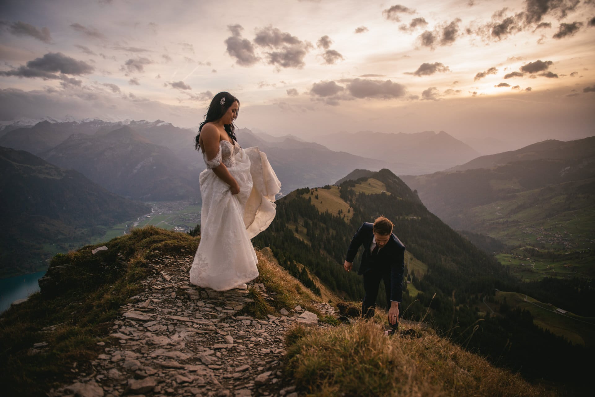 Couple on their elopement day in the Interlaken region of Switzerland - sunset photoshoot on top of the mountain
