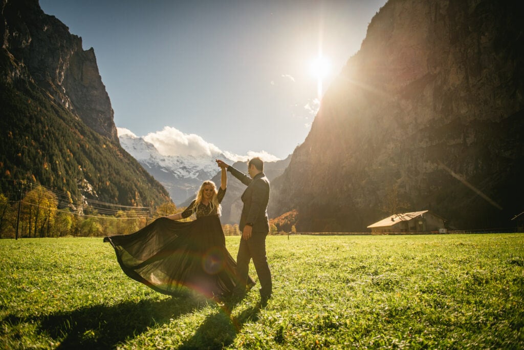 Couple dancing in the Lauterbrunnen valley on their elopement day in Switzerland