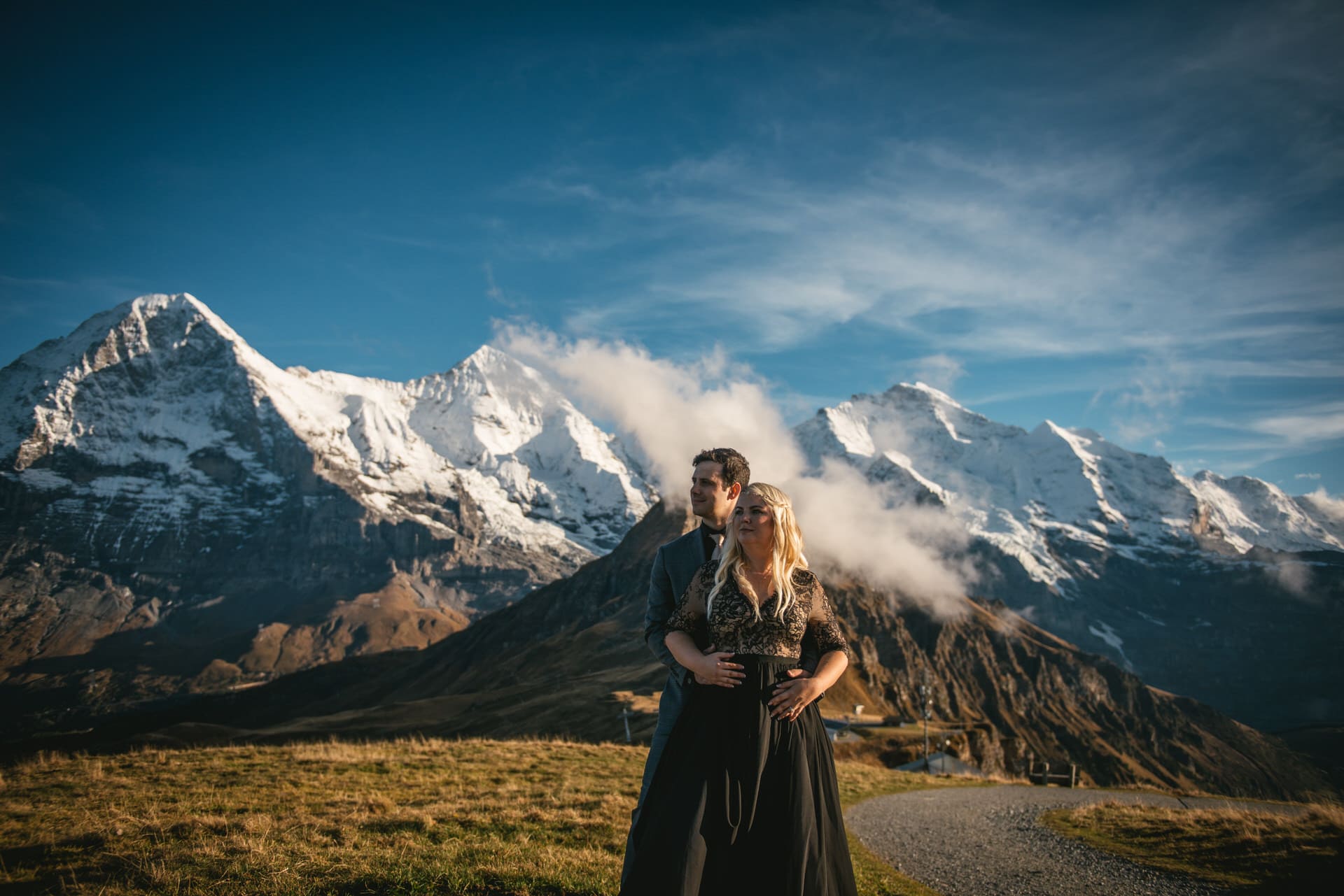Couple exchanging their vows on top of the Mannlichen on their elopement day in Switzerland