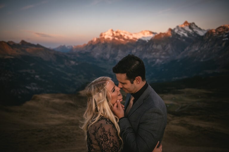A sunset elopement in a magical valley with a ceremony surrounded by majestic mountains