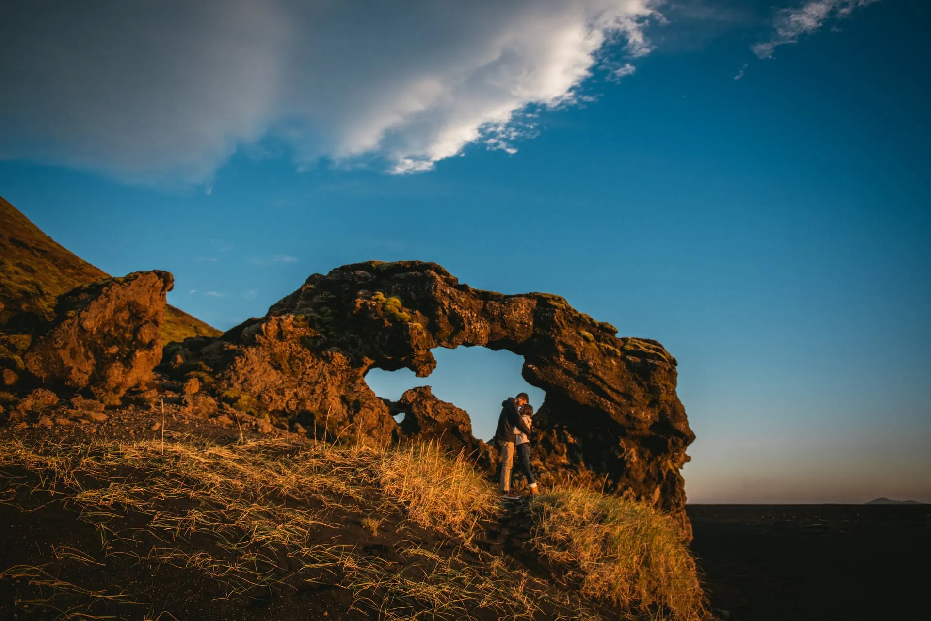 Couple kissing in the Katla delta after their elopement in Iceland