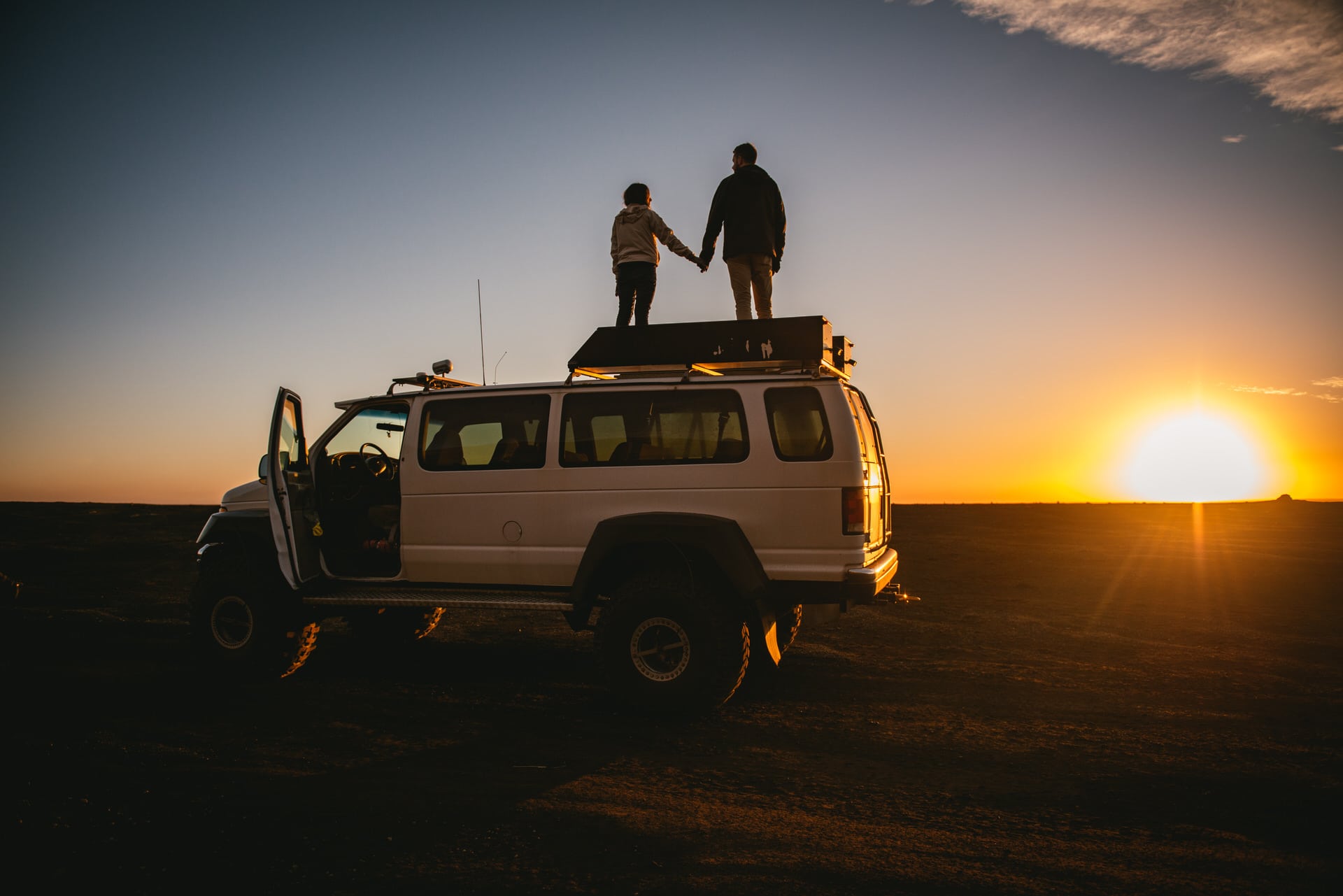 Couple on a superjeep after their elopement in Iceland