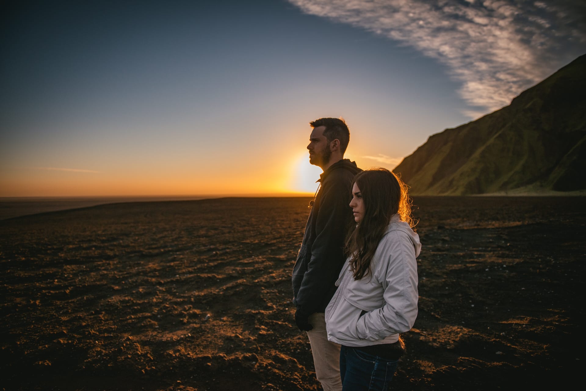 Couple hanging out in a delta after their elopement in Iceland