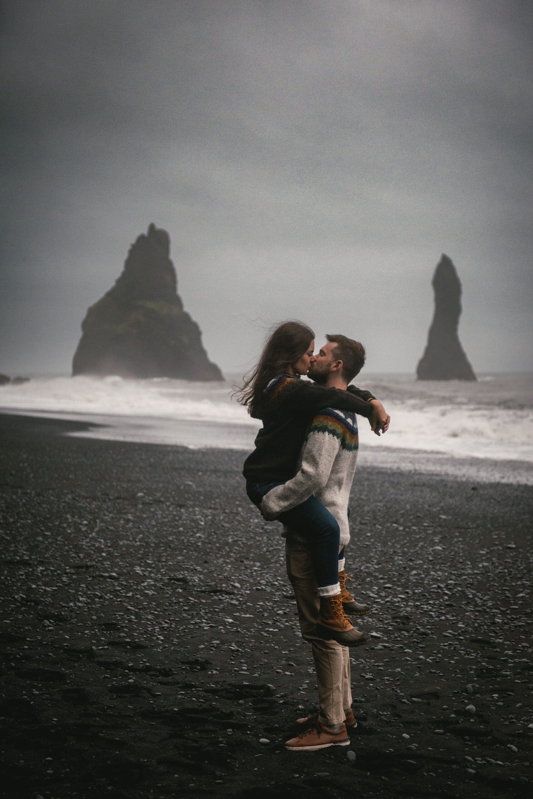Couple on the Reynifsjara beach before their elopement in Iceland