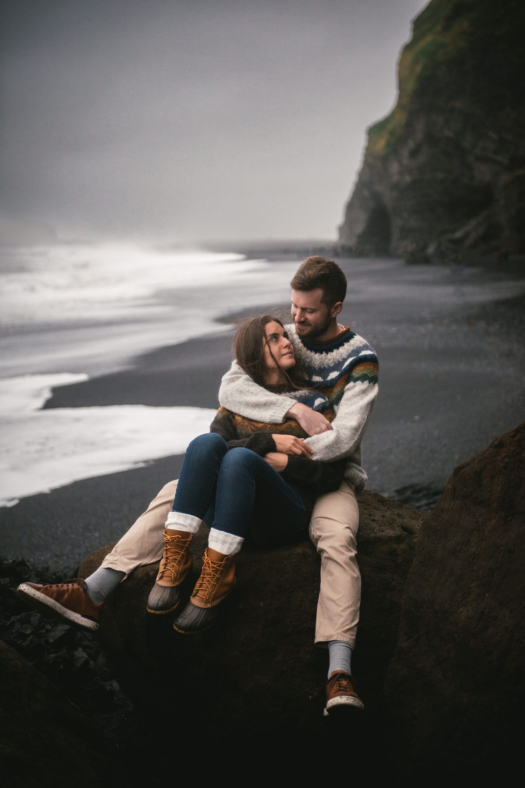 Couple on the Reynifsjara beach before their elopement in Iceland