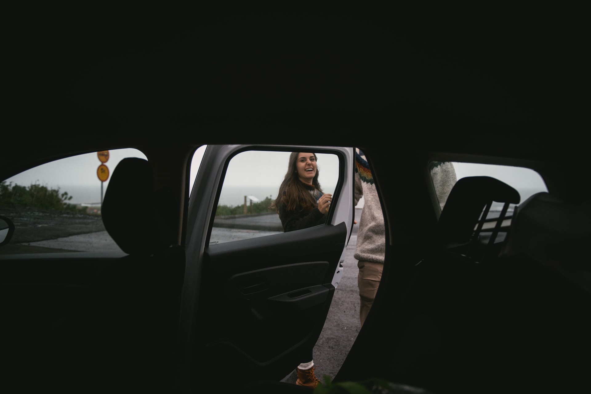 Couple getting in the car before their elopement in Iceland
