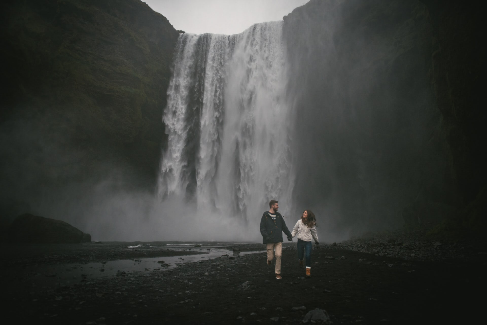Couple at Skogafoss before their elopement in Iceland