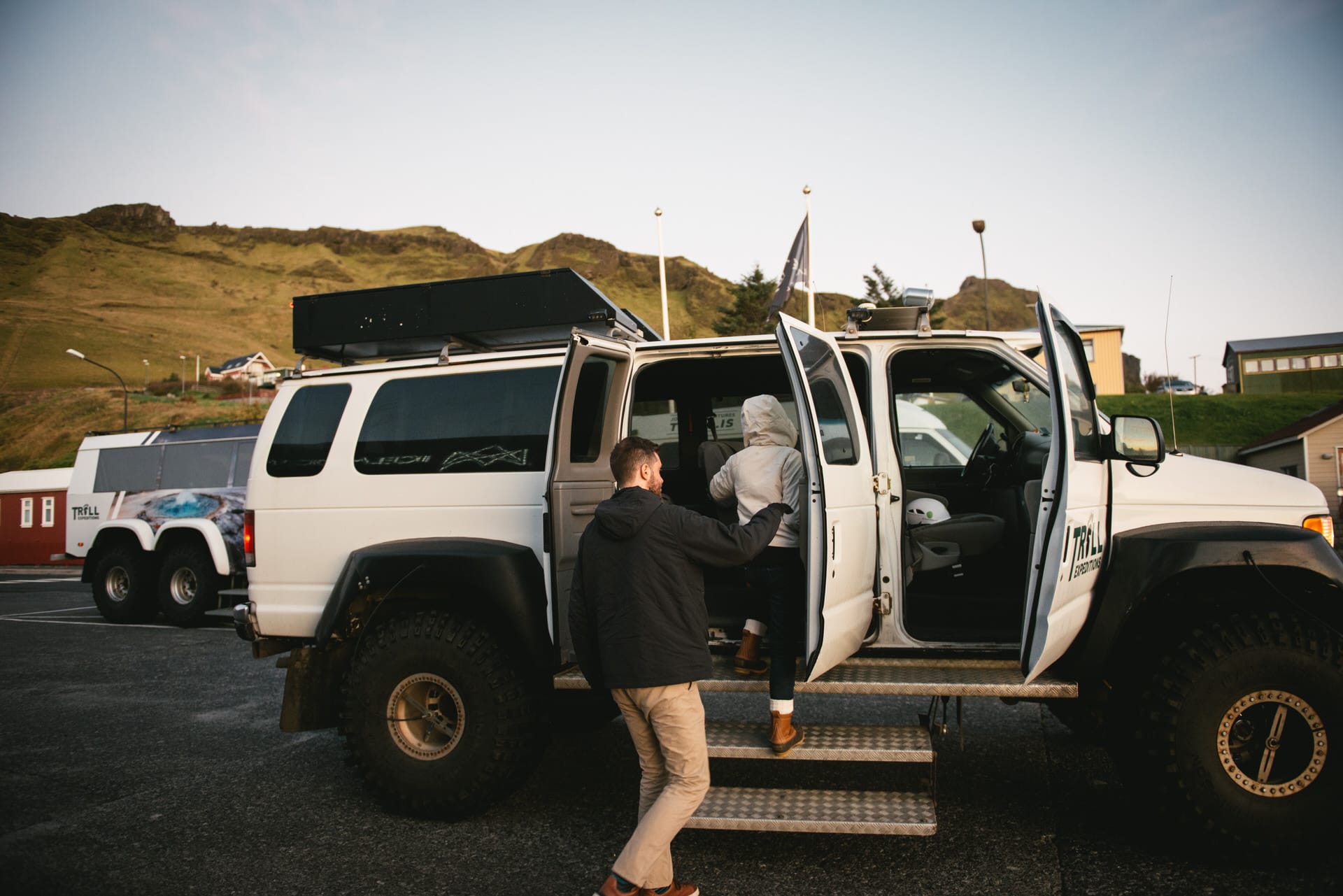 Couple getting on a superjeep after their elopement in Iceland