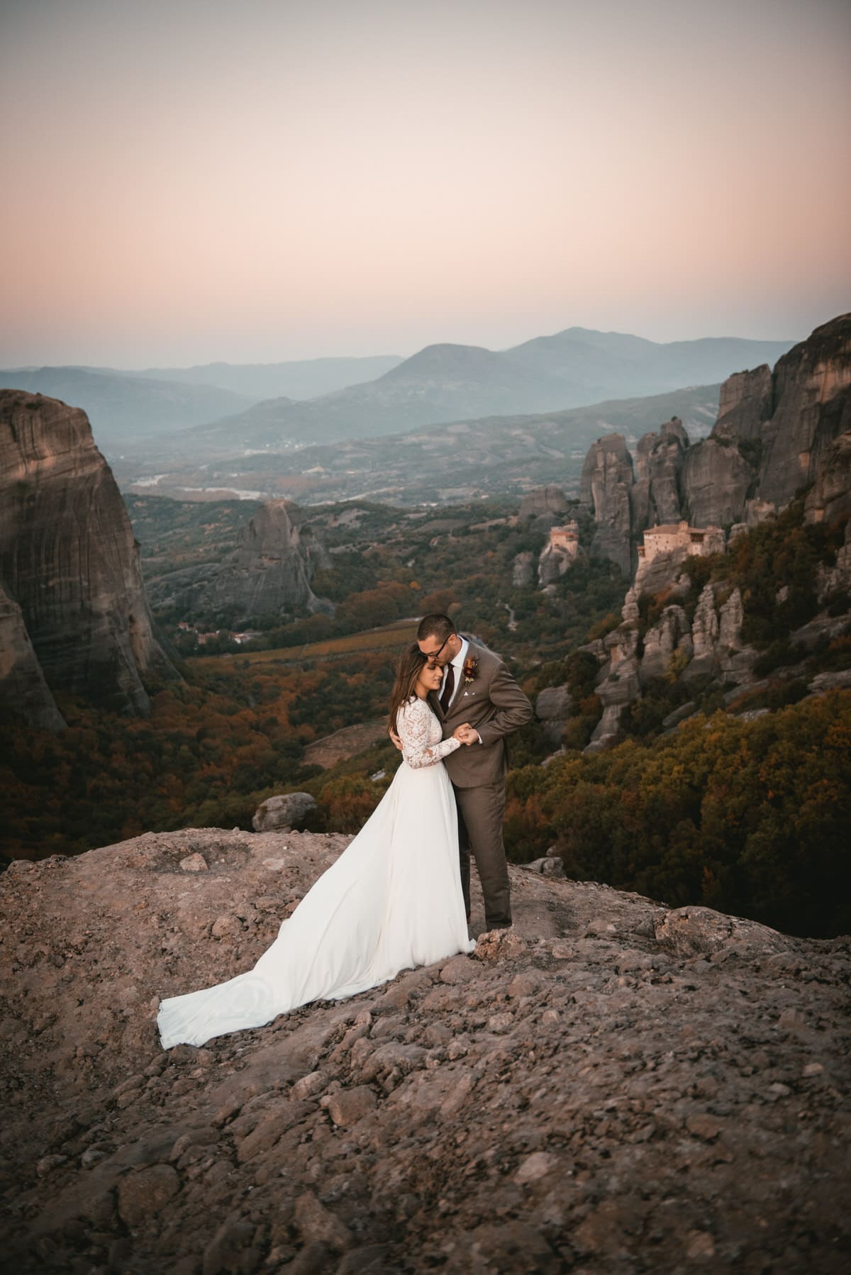 Couple during their first dance on their day after photoshoot in the Meteora in Greece