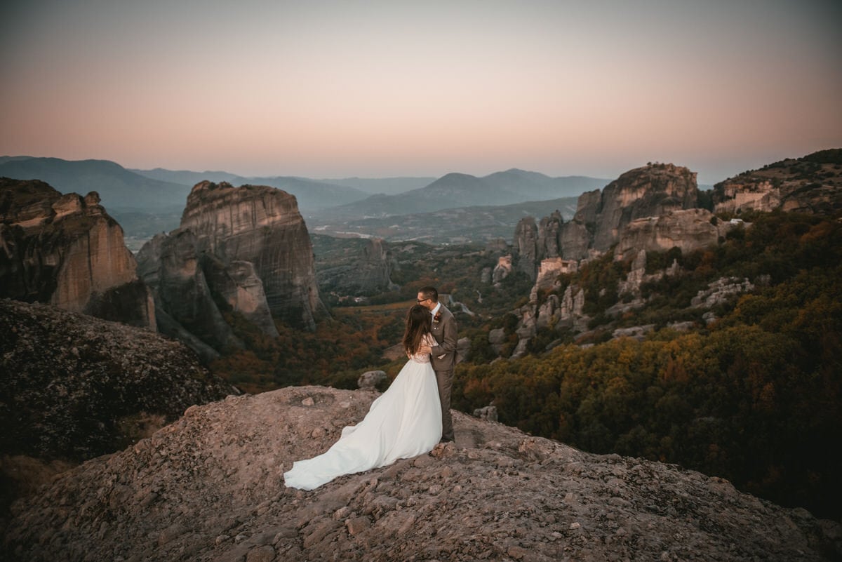 Couple enjoying the Meteora views on their day after photoshoot in the Meteora in Greece