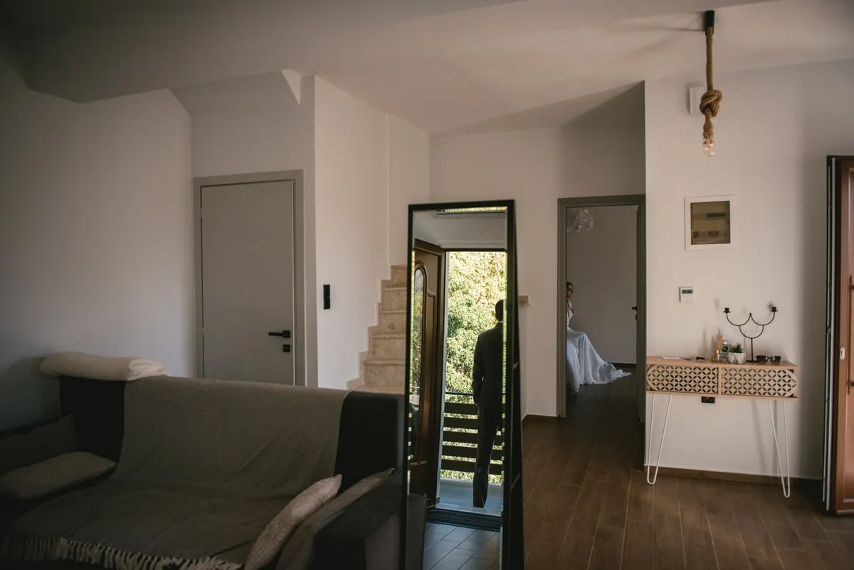 Groom waiting for the bride to be ready on an elopement day in the Meteora