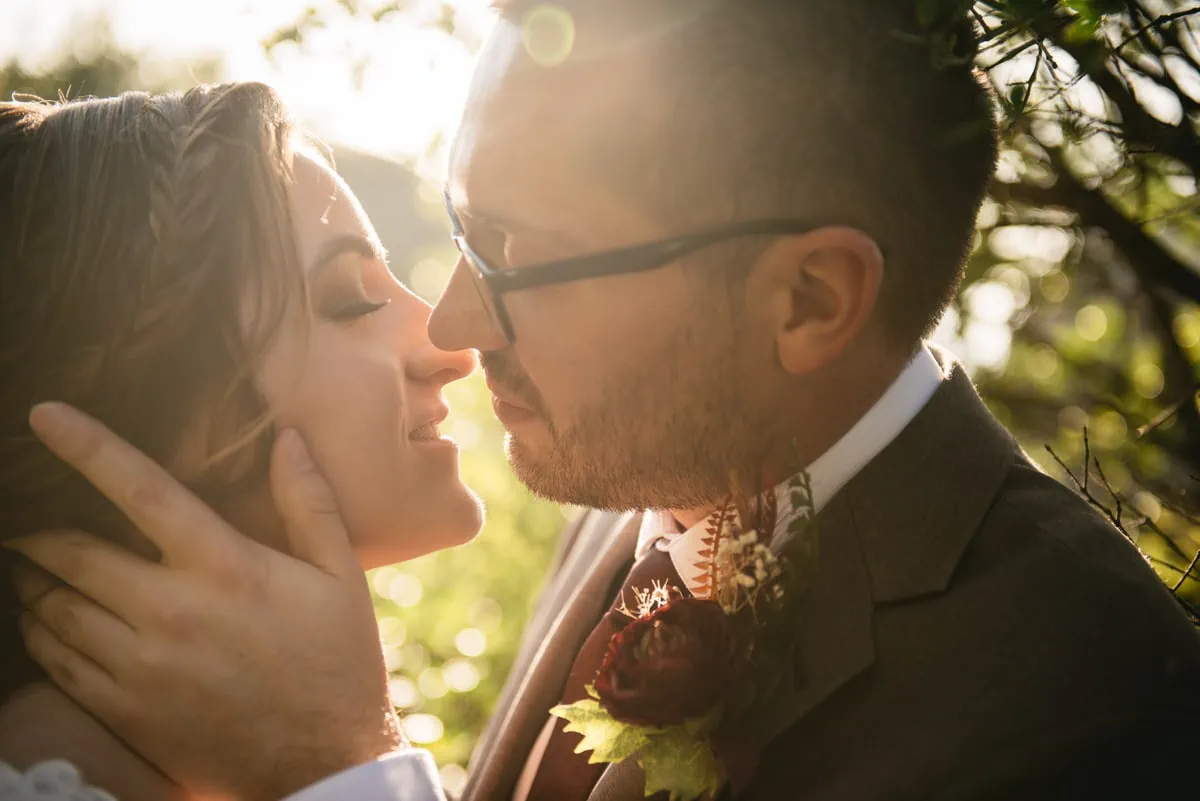 Bride and groom kissing on an elopement day in the Meteora