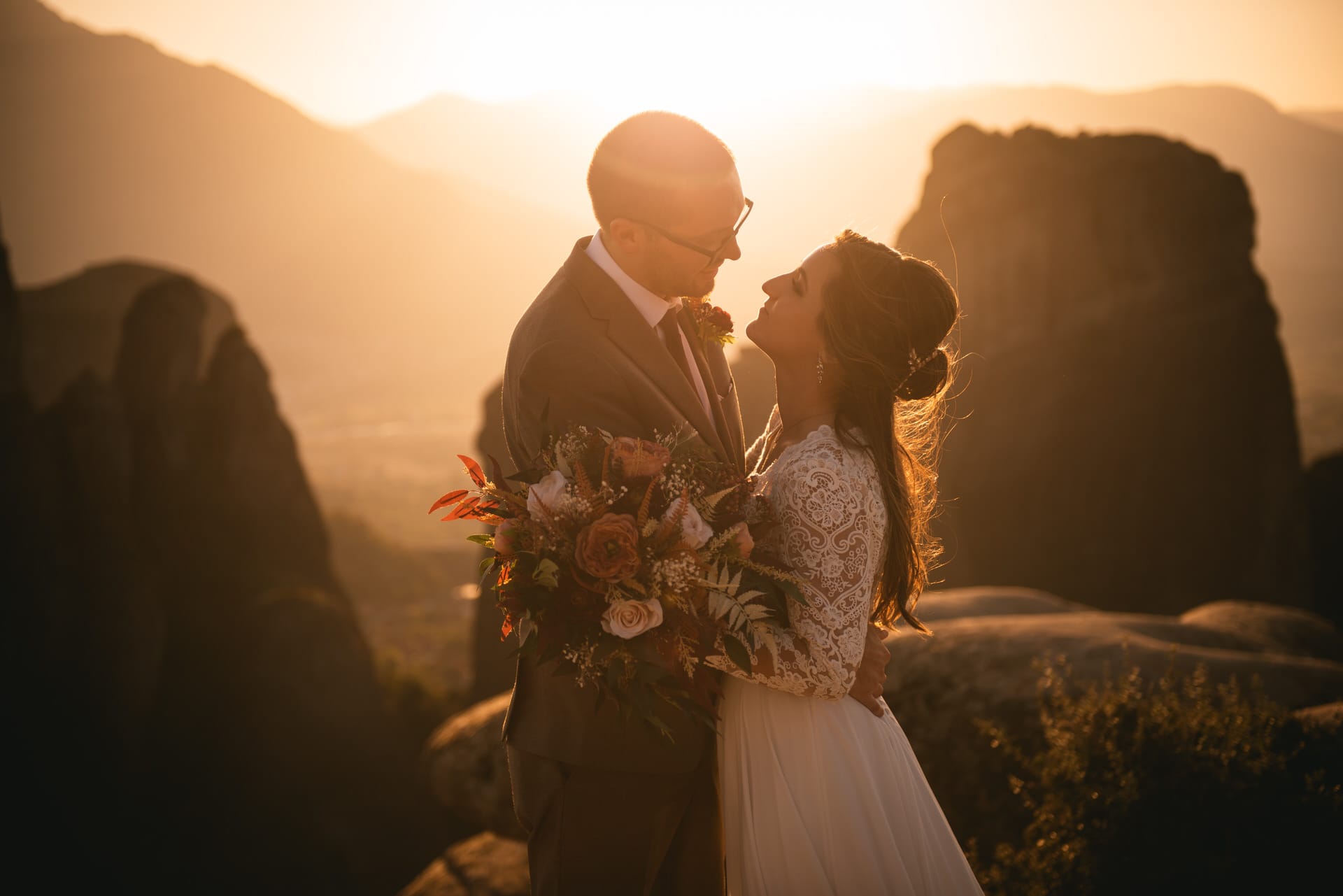 Couple posing on their Meteora wedding elopement