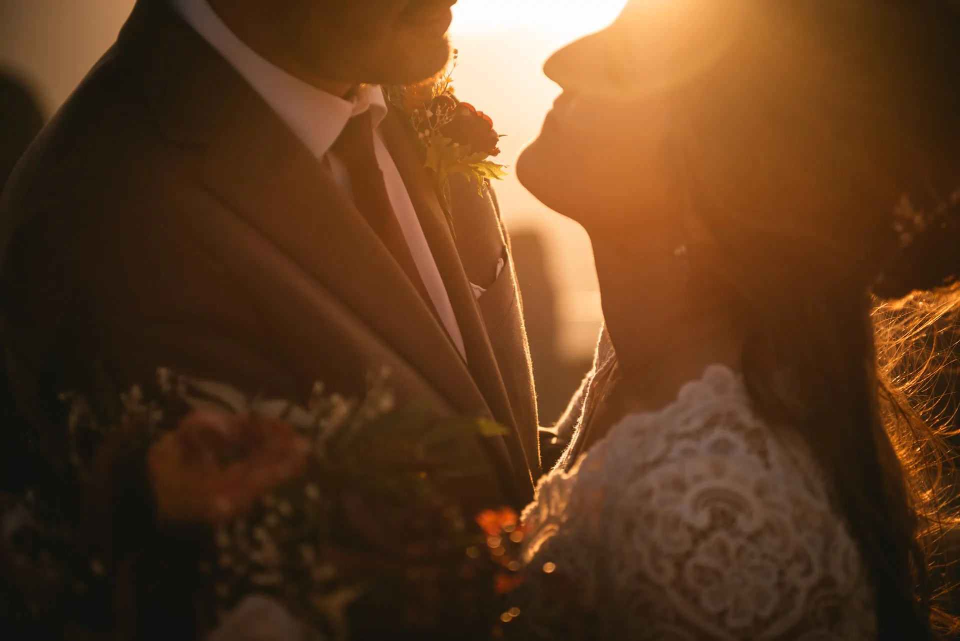 Couple posing at sunset on their Meteora wedding elopement