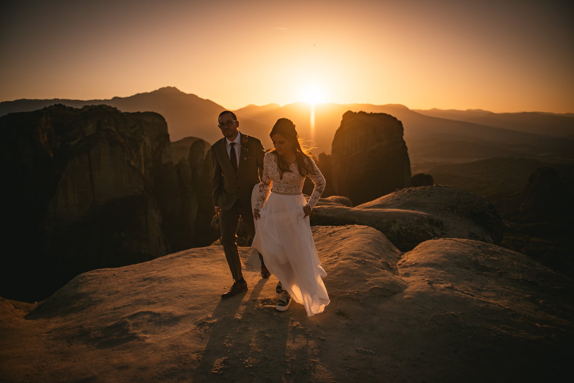 Couple walking on their Meteora wedding elopement