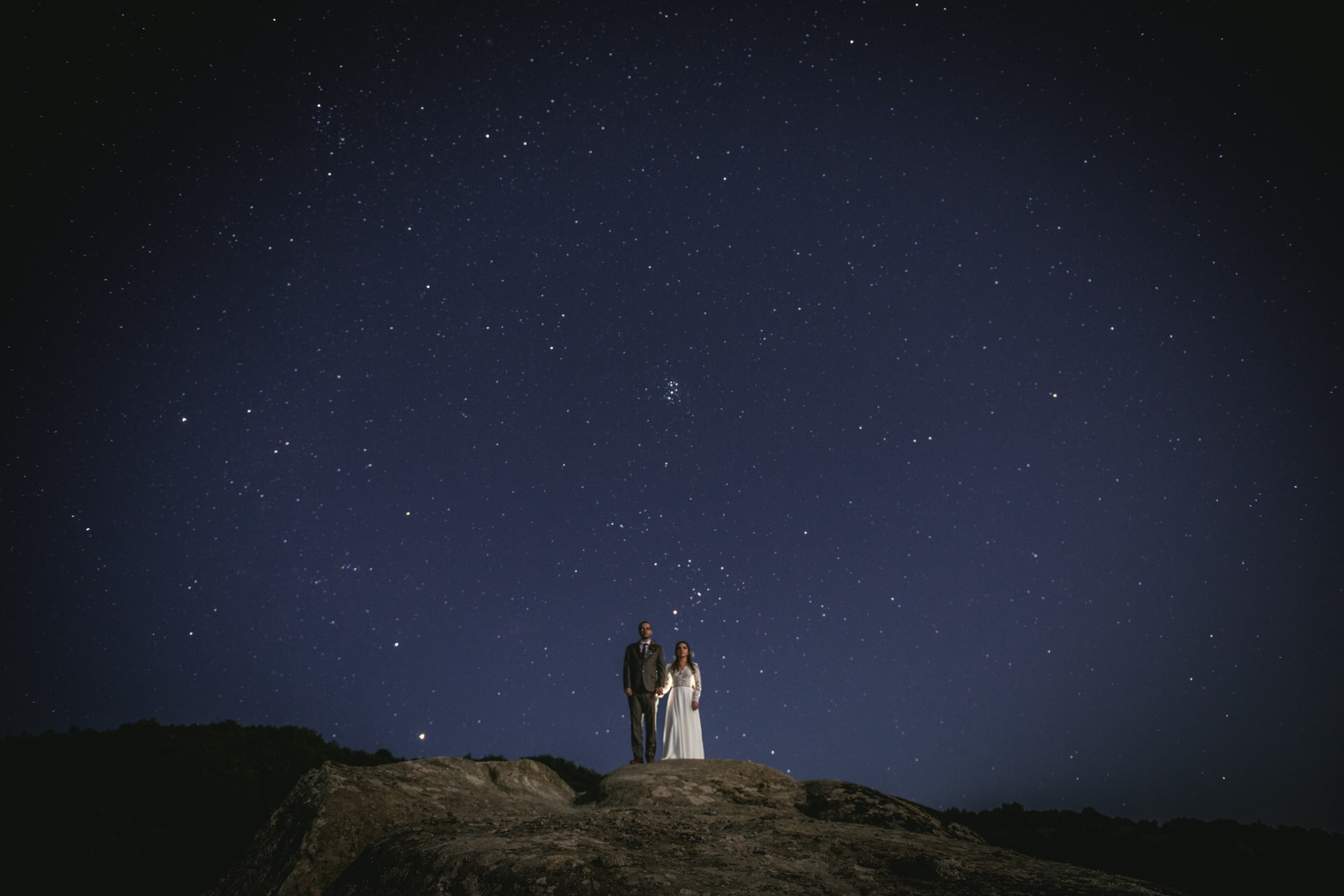 Couple under the milky way on their Meteora wedding elopement