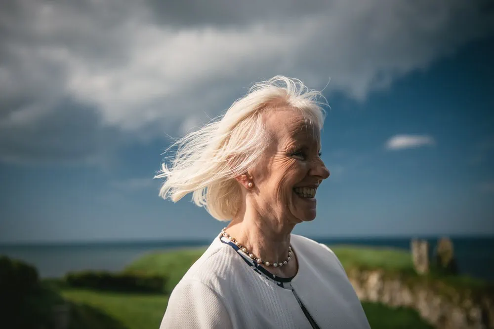 Candid shot of the groom's mom laughing