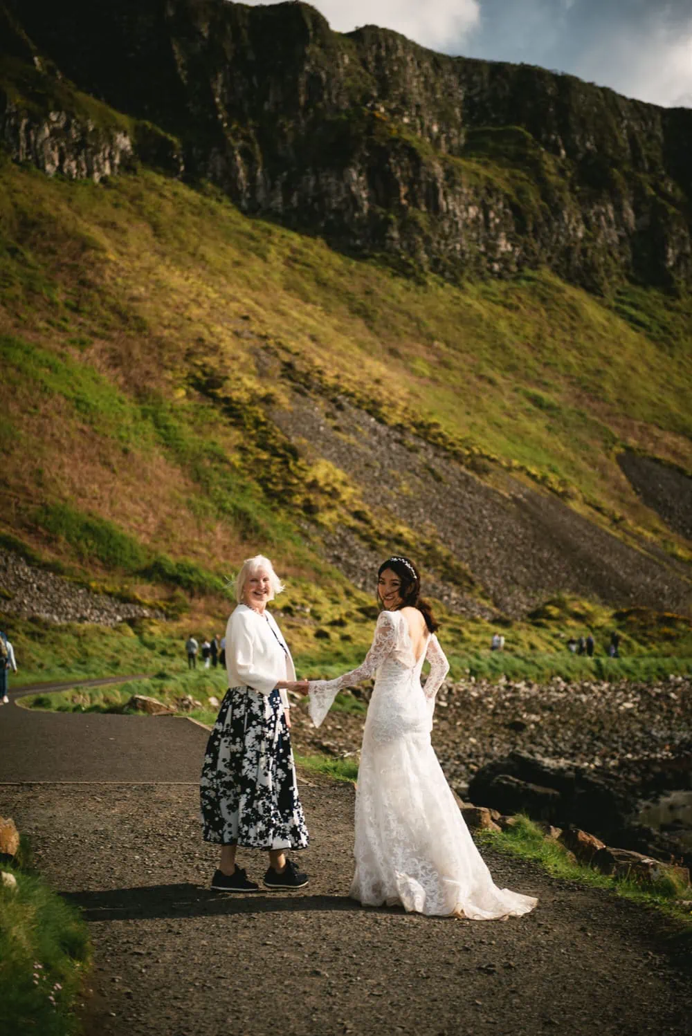 Candid shot of the bride and the groom's mom