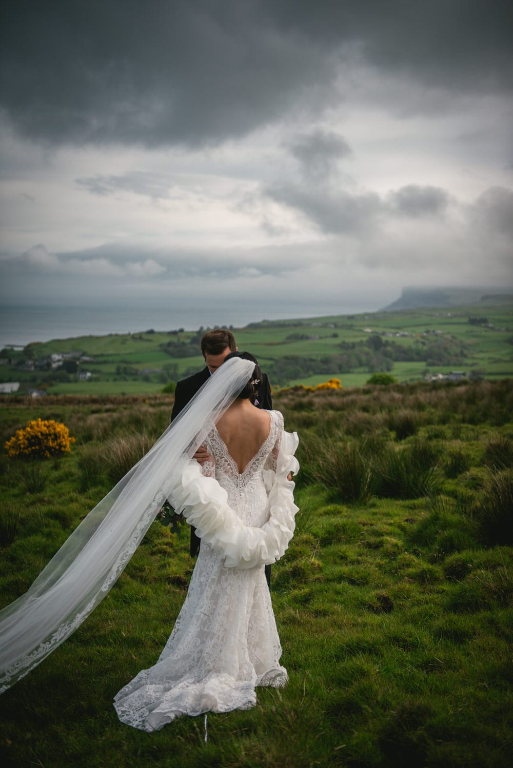 Panoramic view of the emerald green hills and valleys of Northern Ireland during their elopement.